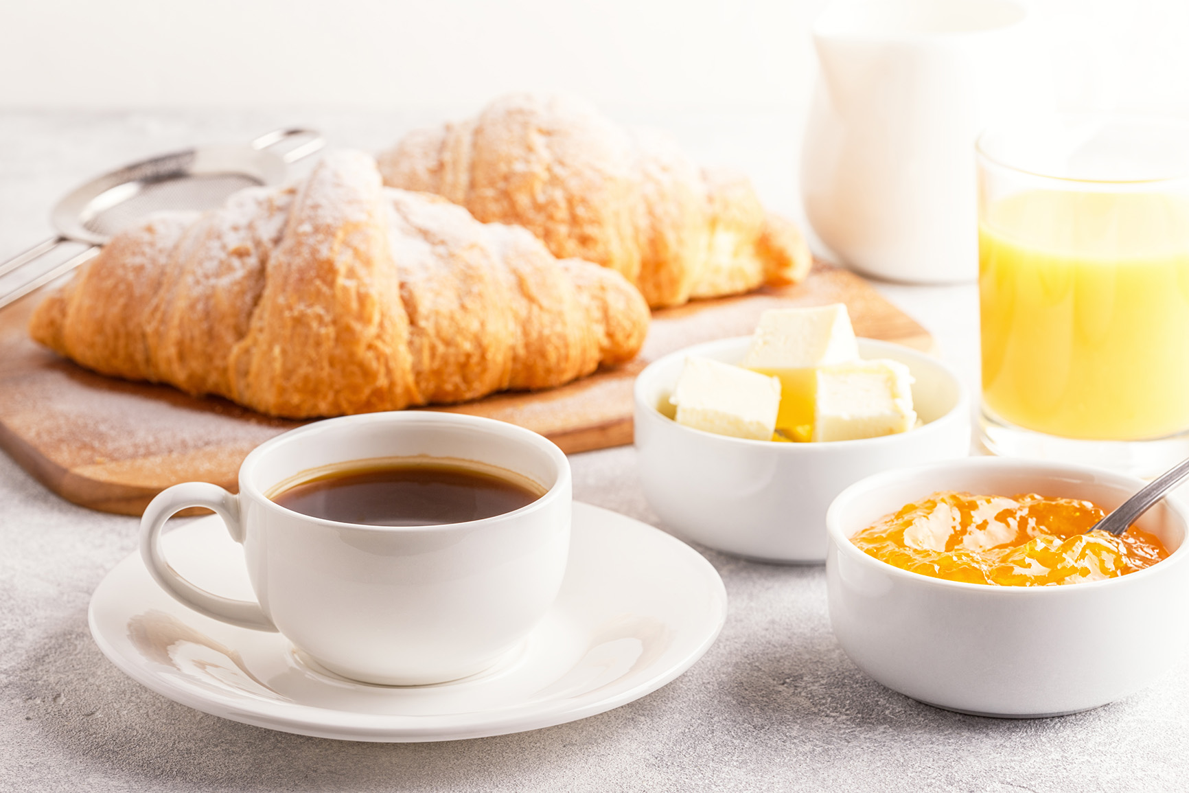 Continental,Breakfast,With,Fresh,Croissants,,Orange,Juice,And,Coffee,,Selective